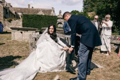 Bride changing her Christian Louboutin shoes to Horse riding boots.